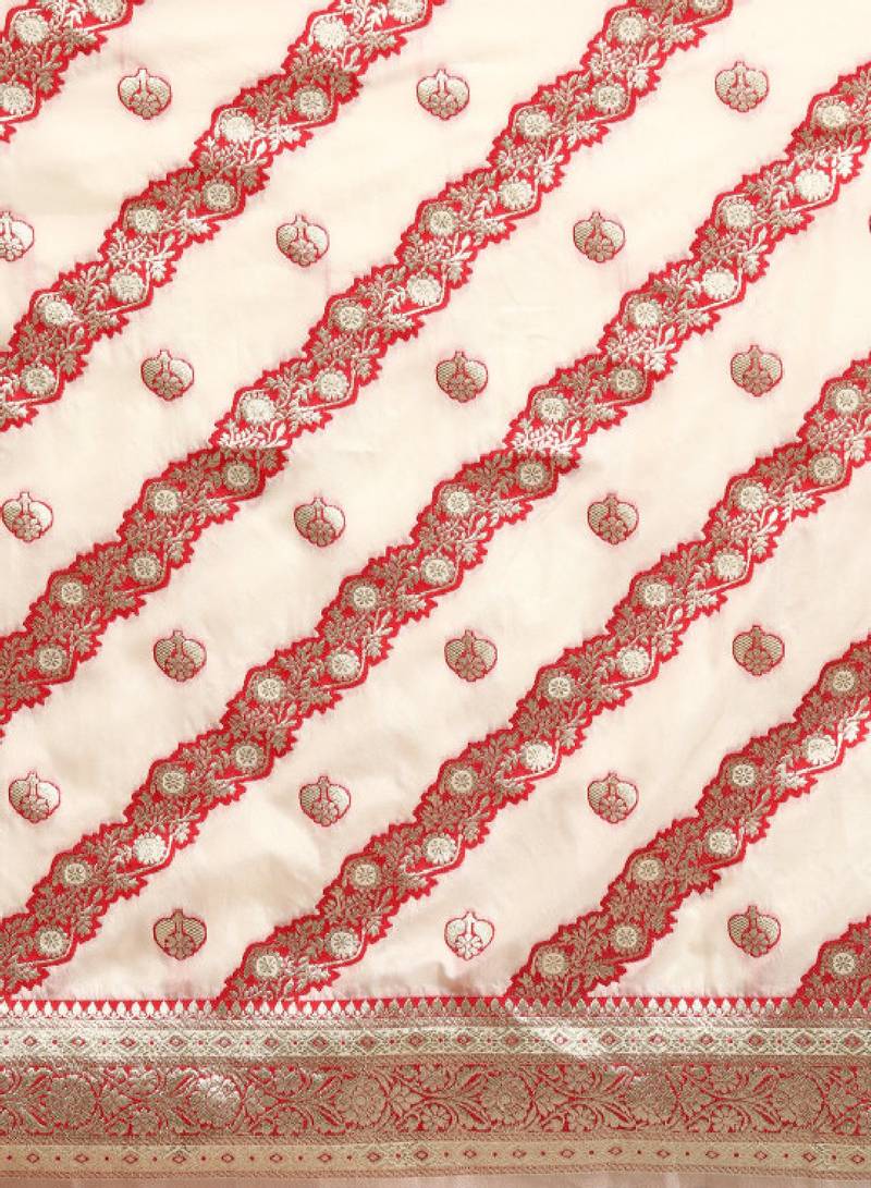 off white silk blend banarasi saree with heavy leheriya work