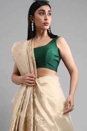 cream turquoise banarasi saree with floral woven zari design