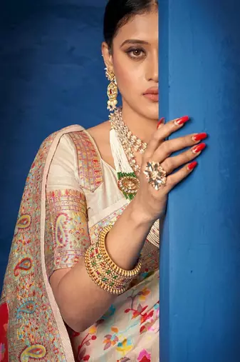 cream zari design kanjeevaram saree with woven ethnic motifs