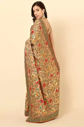cream embroidered designer silk saree