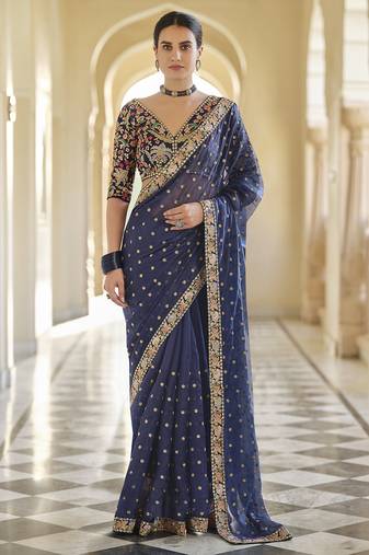 Navy blue organza sequin zari and thread embroidered saree with silk blouse