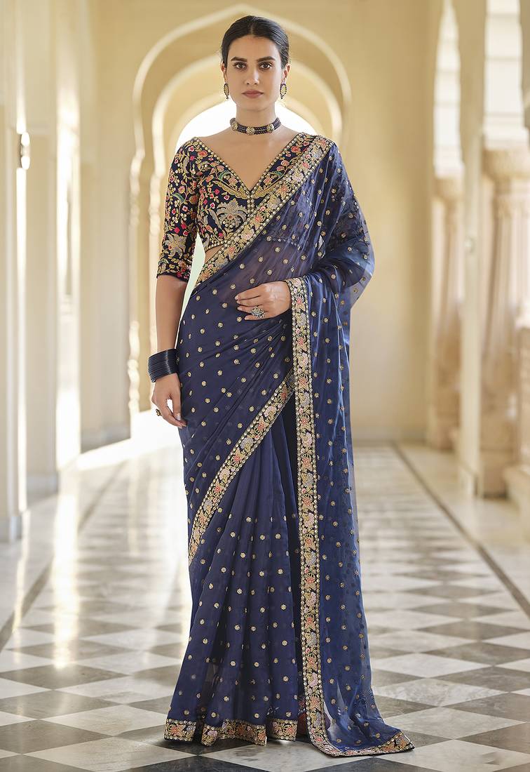 Navy blue organza sequin zari and thread embroidered saree with silk blouse