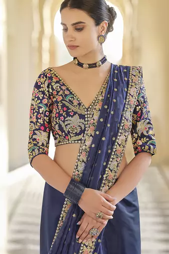 Navy blue organza sequin zari and thread embroidered saree with silk blouse