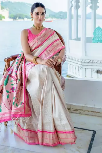 white ethnic motifs woven design zari silk blend kanjeevaram saree