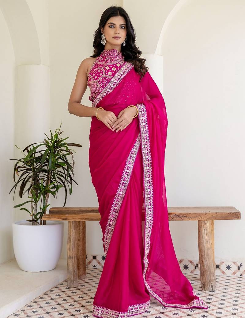 Charming rani pink silk sequins embroidered party wear saree