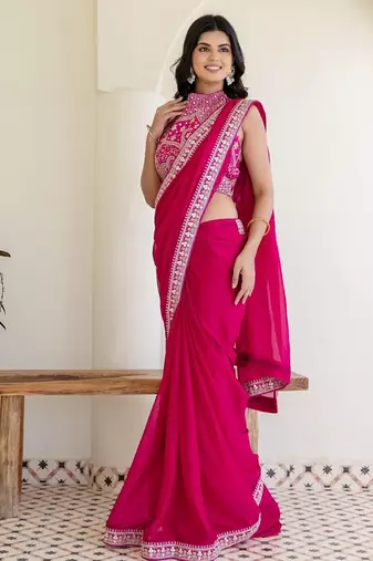 Charming rani pink silk sequins embroidered party wear saree
