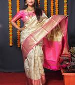 Woven design zari silk blend kanjeevaram saree with blouse piece