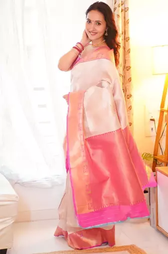 beige silk blend kanjeevaram saree with woven zari