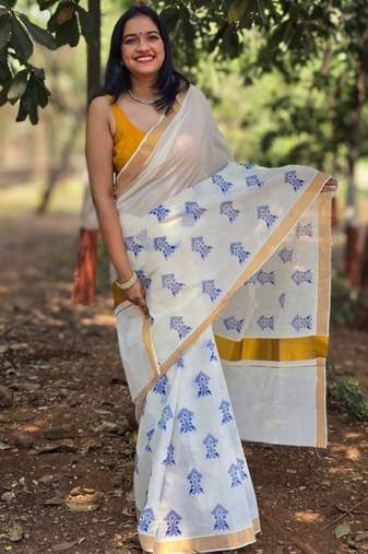 white pure cotton kasavu saree with ethnic motifs zari work