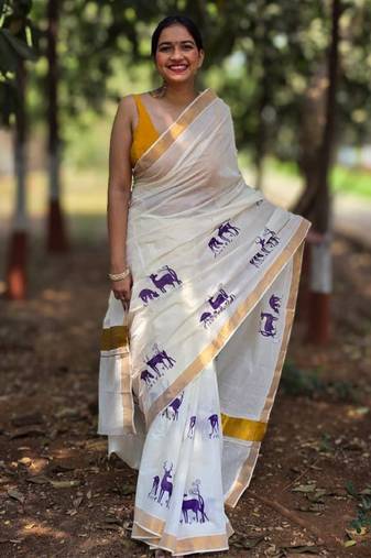 white pure cotton kasavu saree with printed ethnic motifs