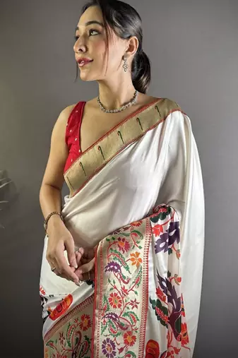 white silk blend kanjeevaram saree with zari and ethnic motifs