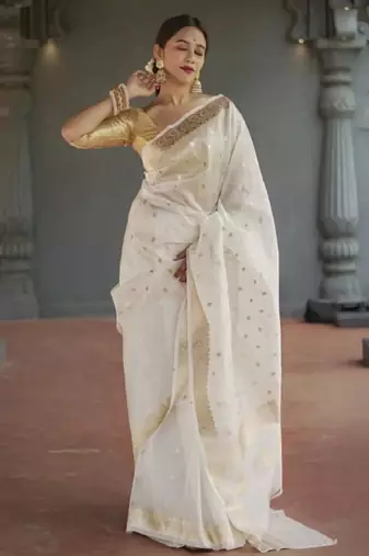 white woven zari kasavu saree