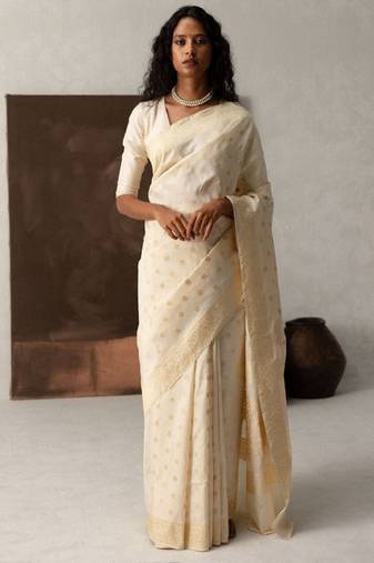 white cotton kanjeevaram saree with woven zari design