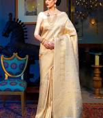 Cream-coloured & gold-toned woven design zari silk blend kanjeevaram saree