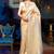 Cream-coloured & gold-toned woven design zari silk blend kanjeevaram saree