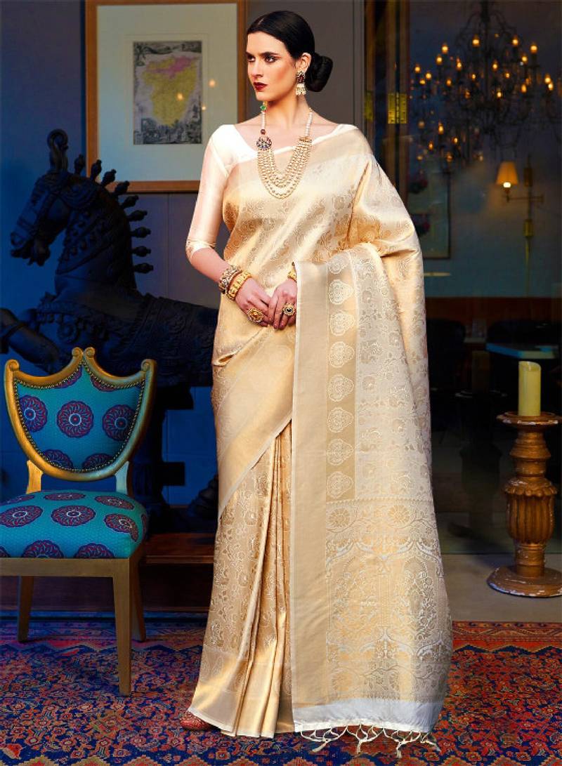 Cream-coloured & gold-toned woven design zari silk blend kanjeevaram saree