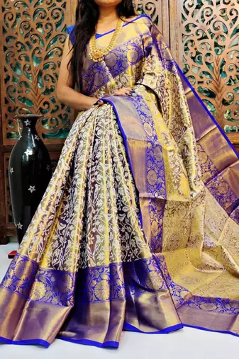 gold silk blend kanjeevaram saree with woven zari and ethnic motifs