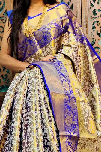 gold silk blend kanjeevaram saree with woven zari and ethnic motifs