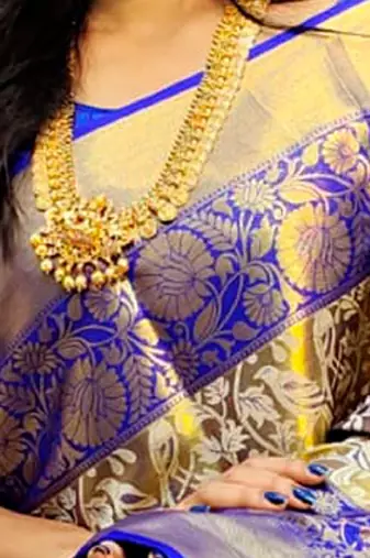 gold silk blend kanjeevaram saree with woven zari and ethnic motifs