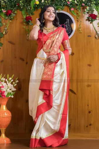white silk blend kanjeevaram saree with woven zari design