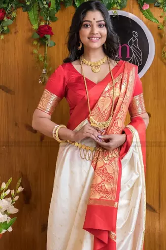 white silk blend kanjeevaram saree with woven zari design