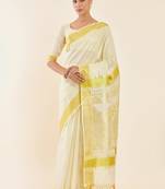Off white paisley woven design zari tissue kasavu saree