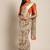 Beige & orange printed saree