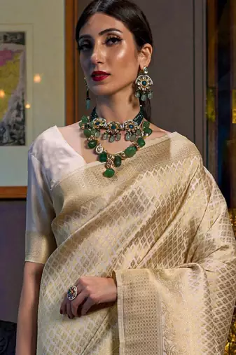 Cream-coloured & gold-toned ethnic motifs zari silk blend kanjeevaram saree