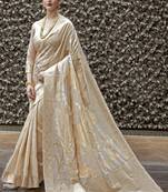 Cream-coloured & gold-toned floral woven design zari banarasi saree