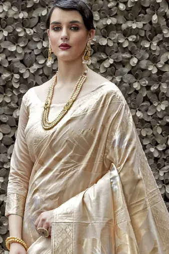 Cream-coloured & gold-toned floral woven design zari banarasi saree