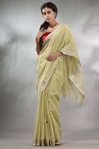 beige silk cotton saree with zari work