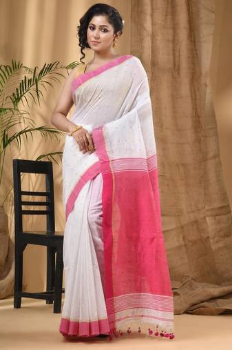 white taant saree with woven zari design