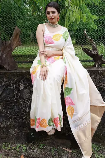 white banarasi silk saree with ethnic motifs zari design