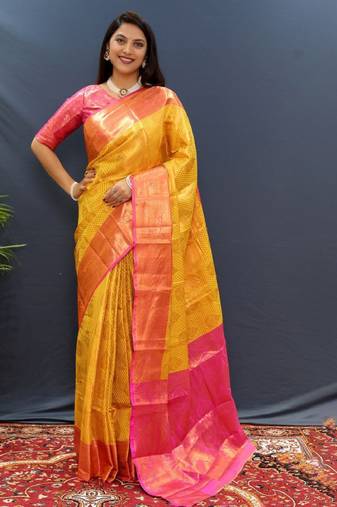 gold silk kanjeevaram saree with woven zari design