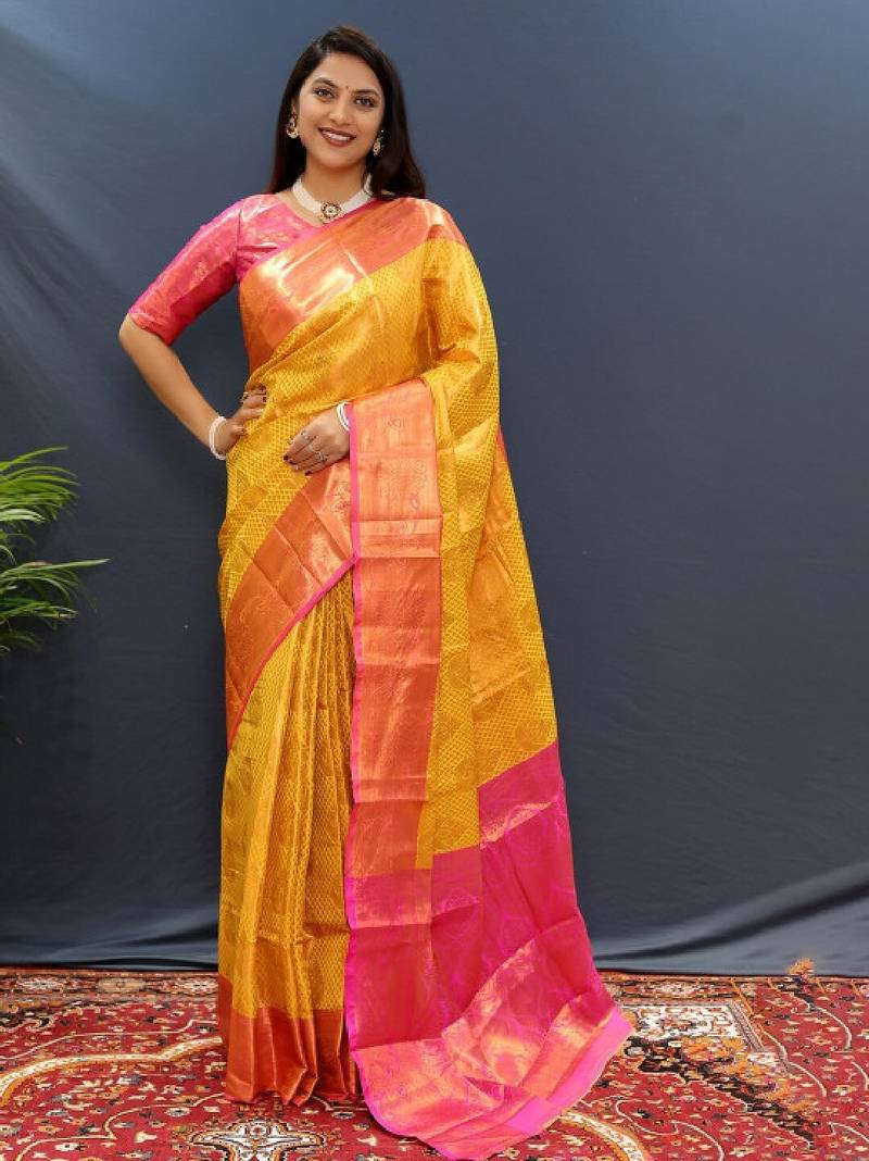gold silk kanjeevaram saree with woven zari design