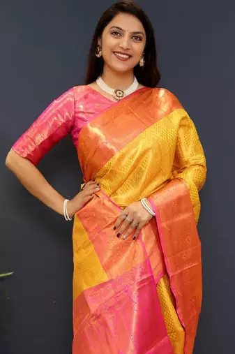 gold silk kanjeevaram saree with woven zari design