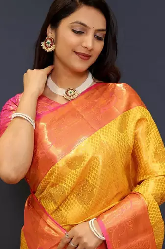 gold silk kanjeevaram saree with woven zari design