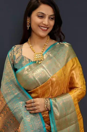 gold silk kanjeevaram saree with zari woven work