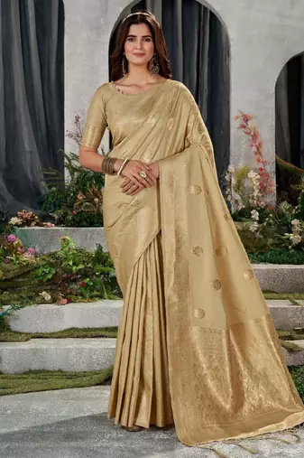 beige kanjeevaram saree with traditional zari work
