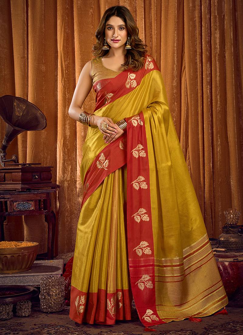 Mustard yellow soft tissue silk blend saree with red woven border