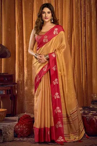 Beige gold soft tissue silk blend saree with rani pink zari woven border