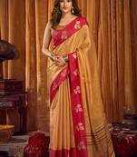 Beige gold soft tissue silk blend saree with rani pink zari woven border