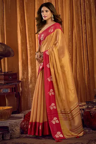 Beige gold soft tissue silk blend saree with rani pink zari woven border