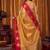 Beige gold soft tissue silk blend saree with rani pink zari woven border