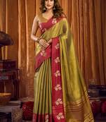 Olive green soft tissue silk blend saree with rani pink zari woven border