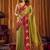 Olive green soft tissue silk blend saree with rani pink zari woven border