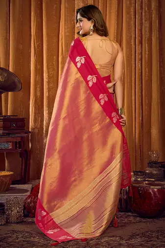 Peach pink soft tissue silk blend saree with rani pink zari woven border