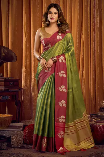 Green soft tissue silk blend saree with wine red zari woven border