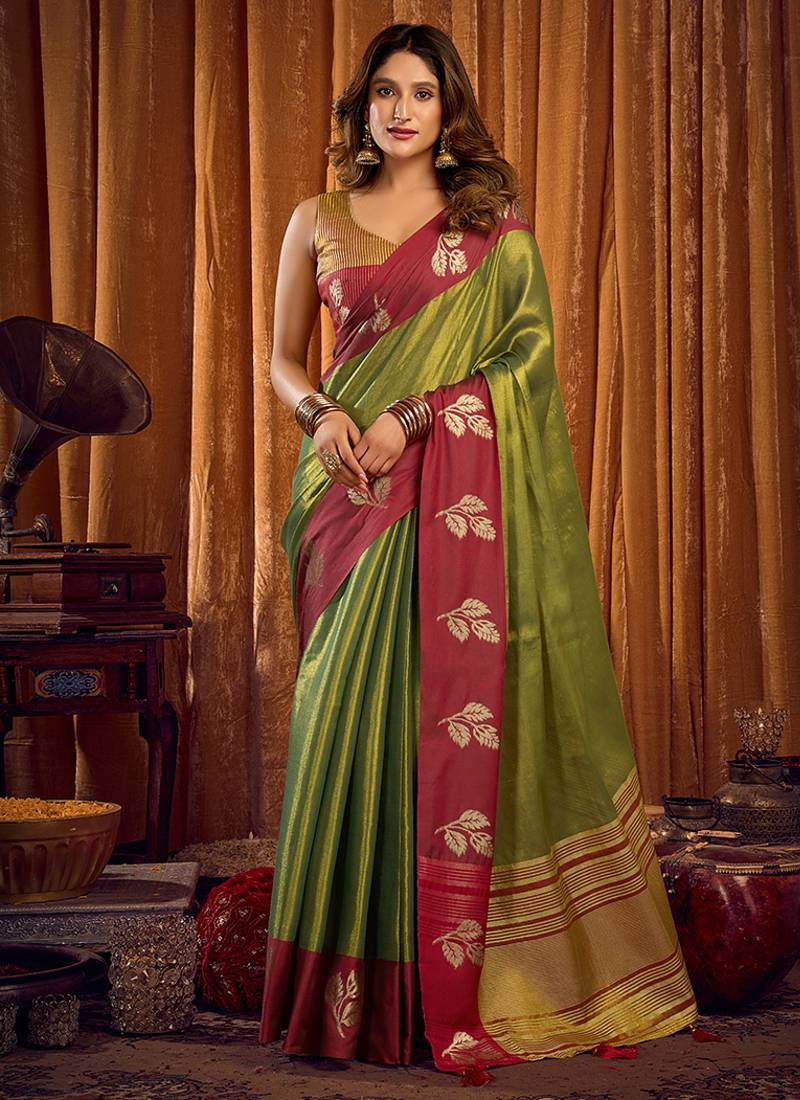 Green soft tissue silk blend saree with wine red zari woven border