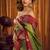 Green soft tissue silk blend saree with wine red zari woven border
